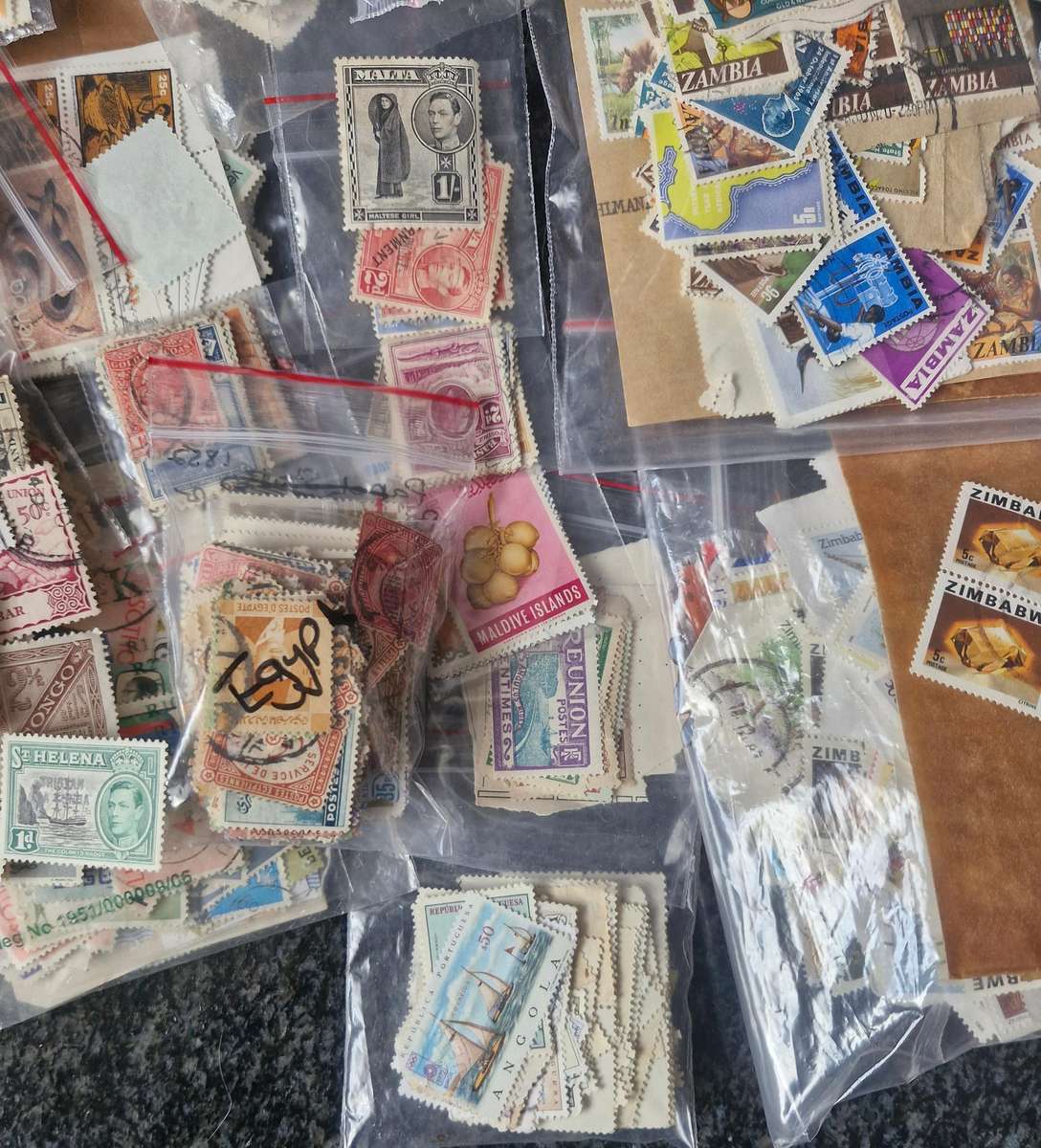LUCKY PACKET OF STAMPS FROM AFRICA - SEMI SORTED WITH OVER 35 COUNTRIES IN THE PACK