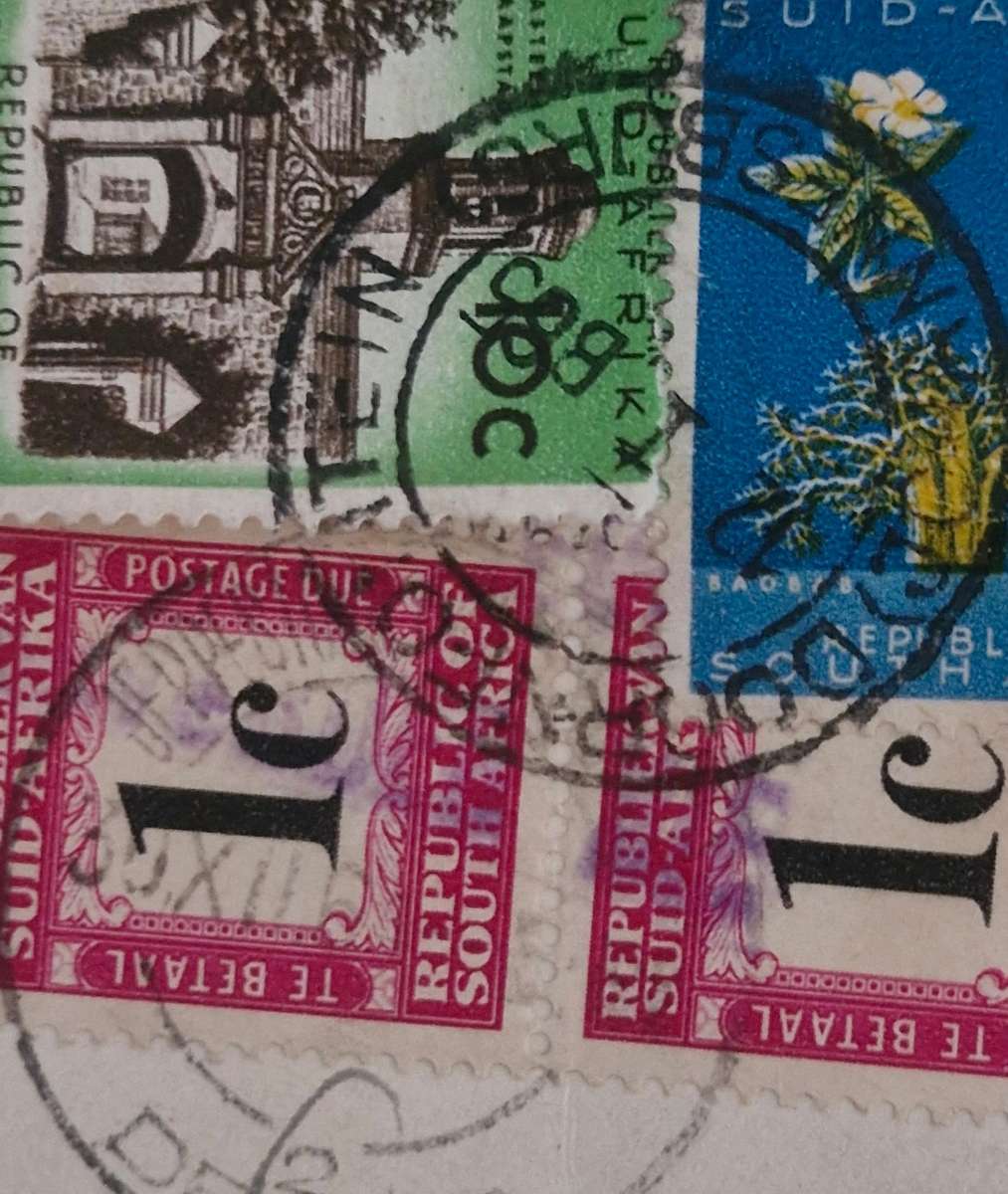 Stamps with 4 different cancellations- USAirmail, South African Postage, & SA postage due stamp
