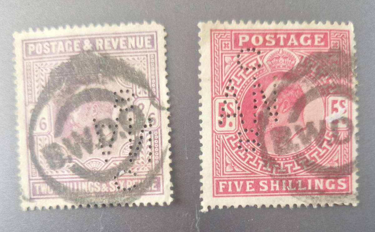 British 1902 2/6 shilling and 1902 5 shilling stamps with same perfin and cancellation stamp