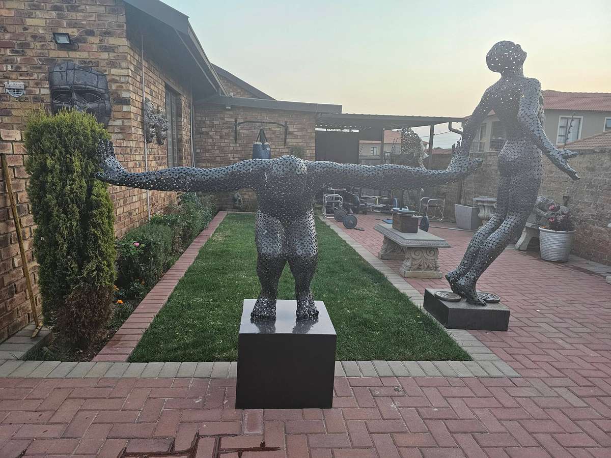 Diver Metal Washers Sculpture on a Polished Metal Base