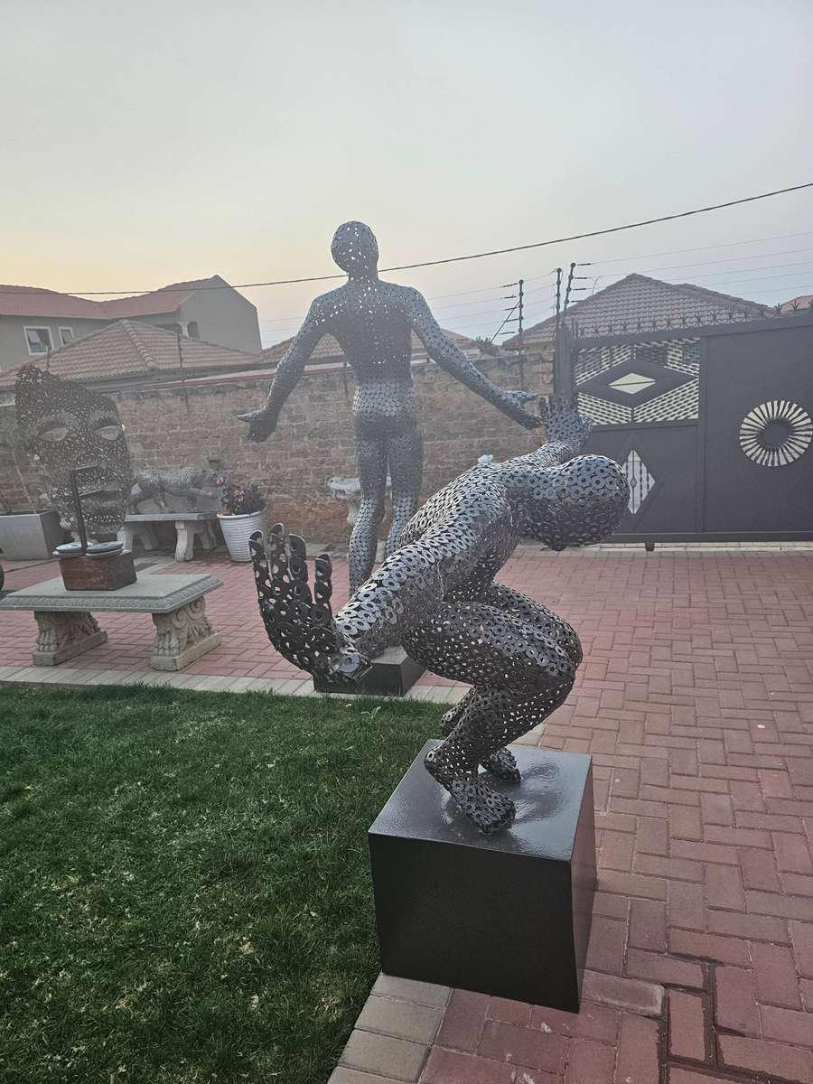 Diver Metal Washers Sculpture on a Polished Metal Base