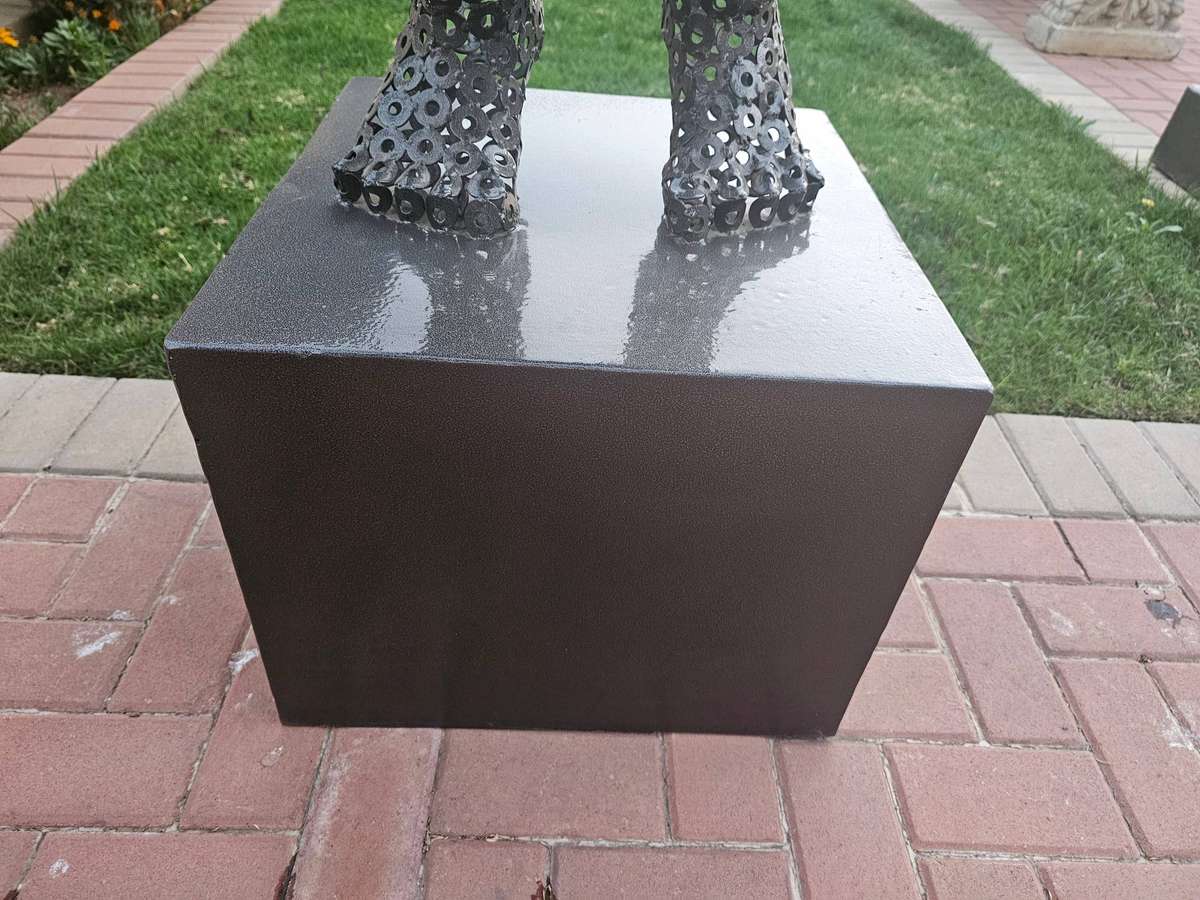 Diver Metal Washers Sculpture on a Polished Metal Base