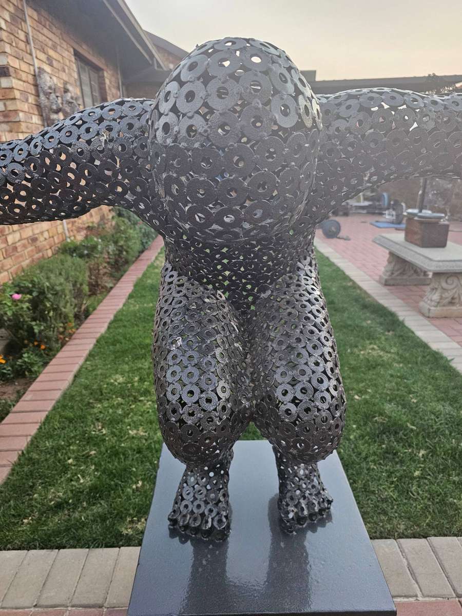 Diver Metal Washers Sculpture on a Polished Metal Base