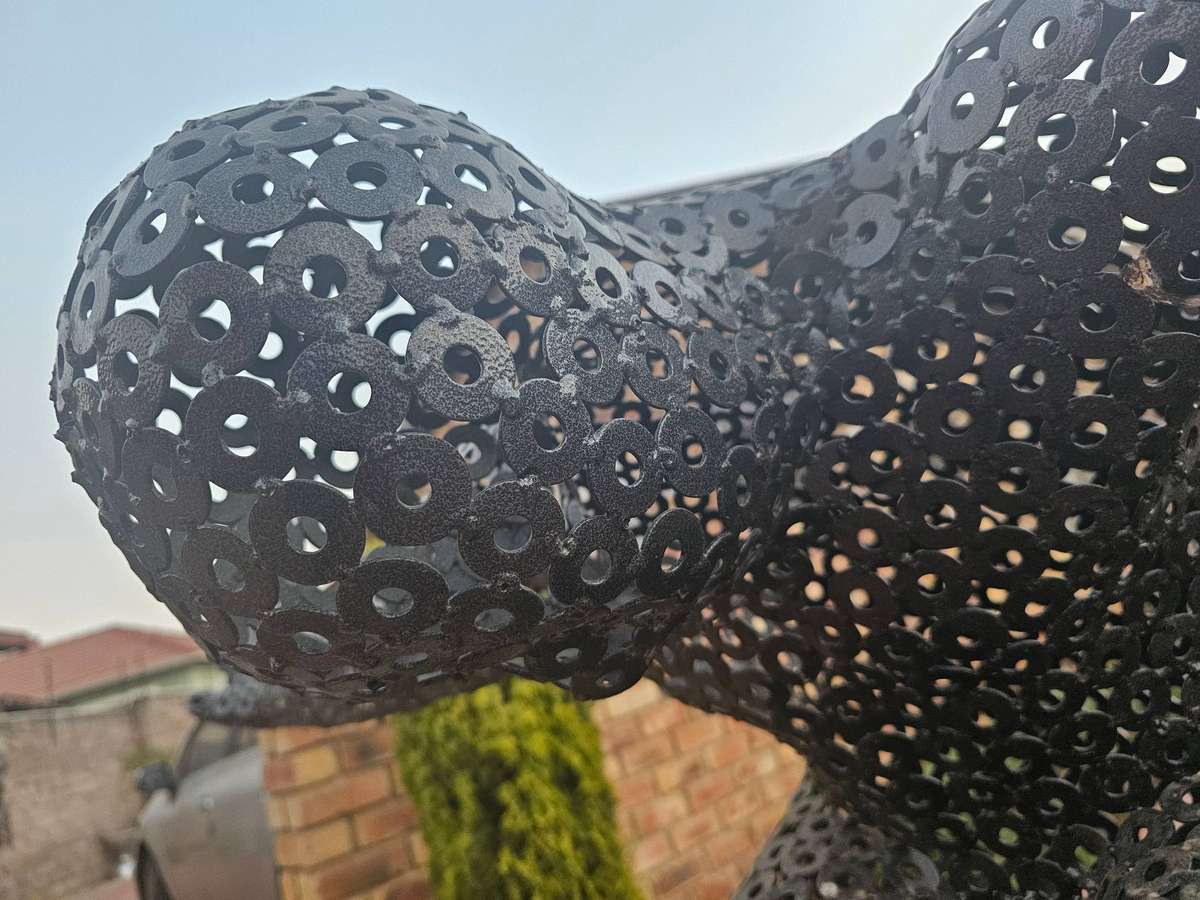 Diver Metal Washers Sculpture on a Polished Metal Base