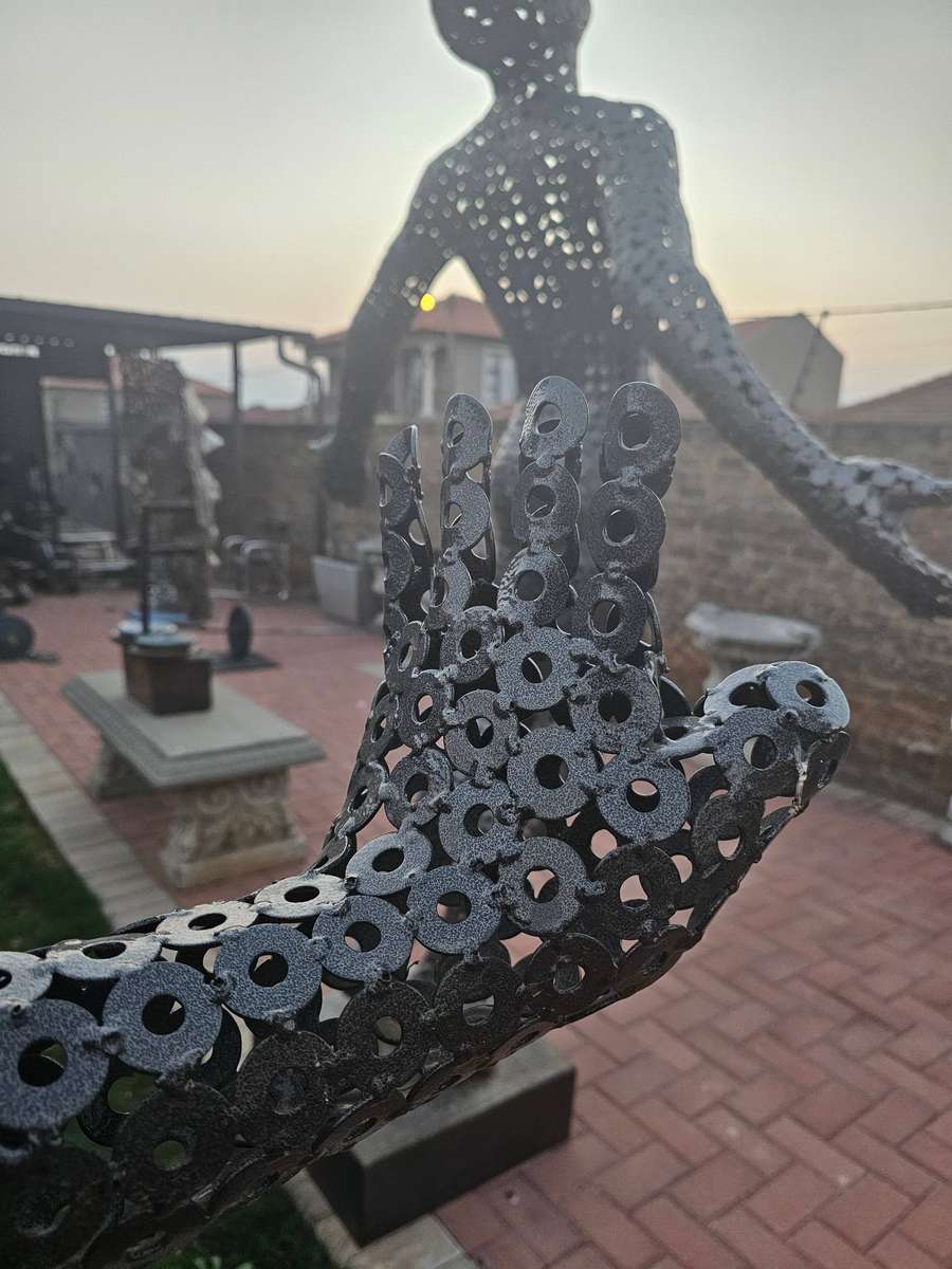 Diver Metal Washers Sculpture on a Polished Metal Base