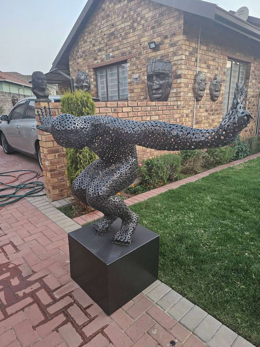 Diver Metal Washers Sculpture on a Polished Metal Base