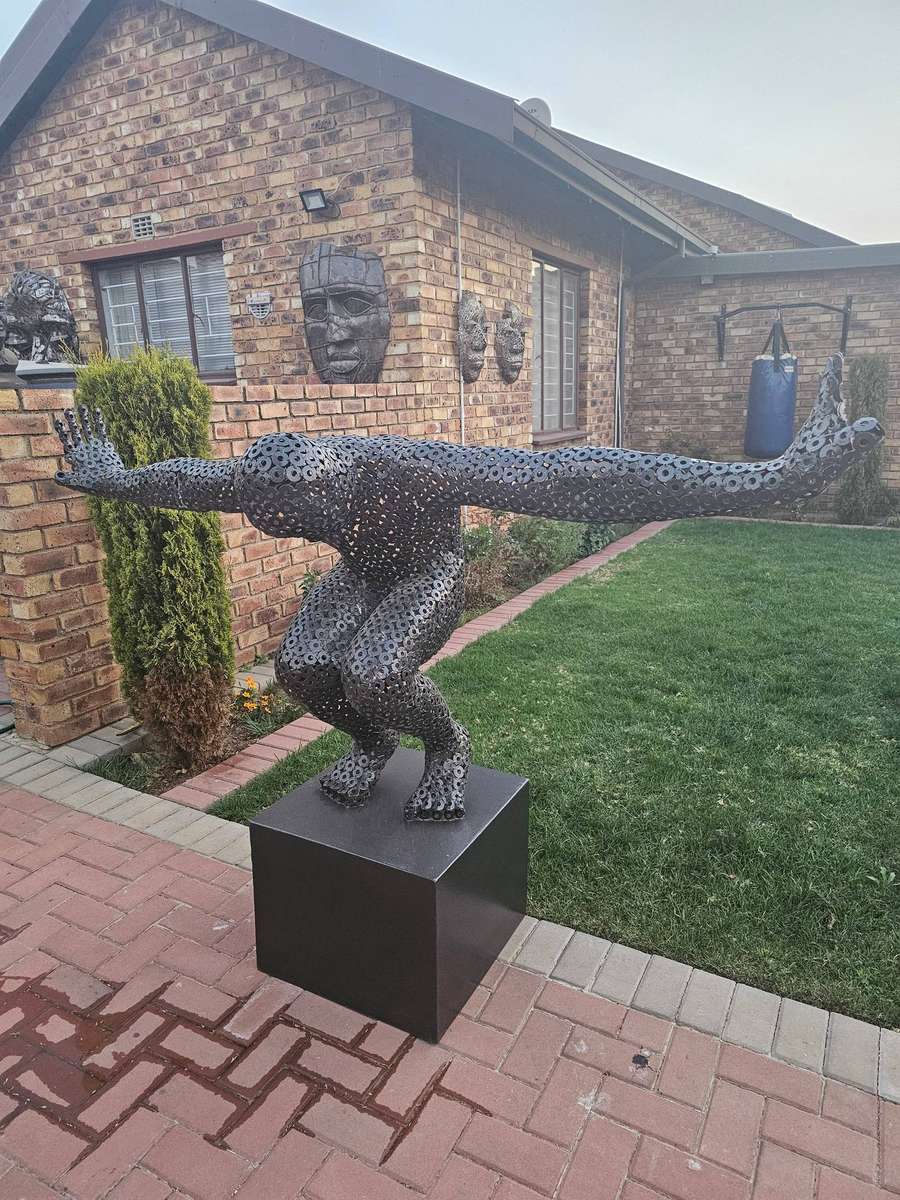 Diver Metal Washers Sculpture on a Polished Metal Base