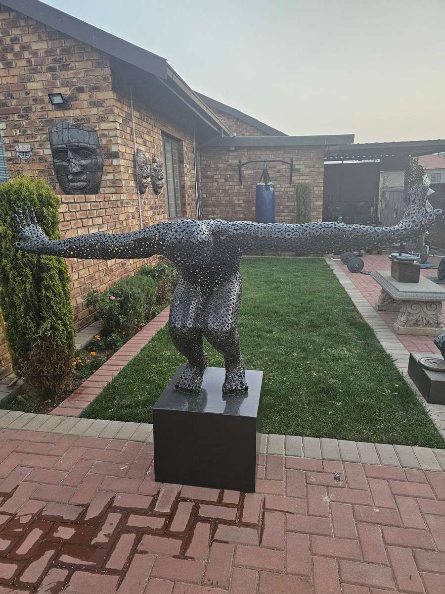 Diver Metal Washers Sculpture on a Polished Metal Base