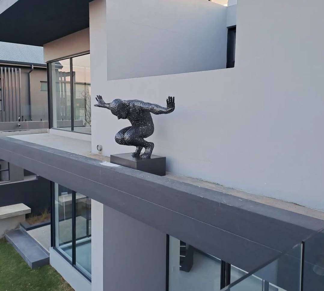 Diver Metal Washers Sculpture on a Polished Metal Base