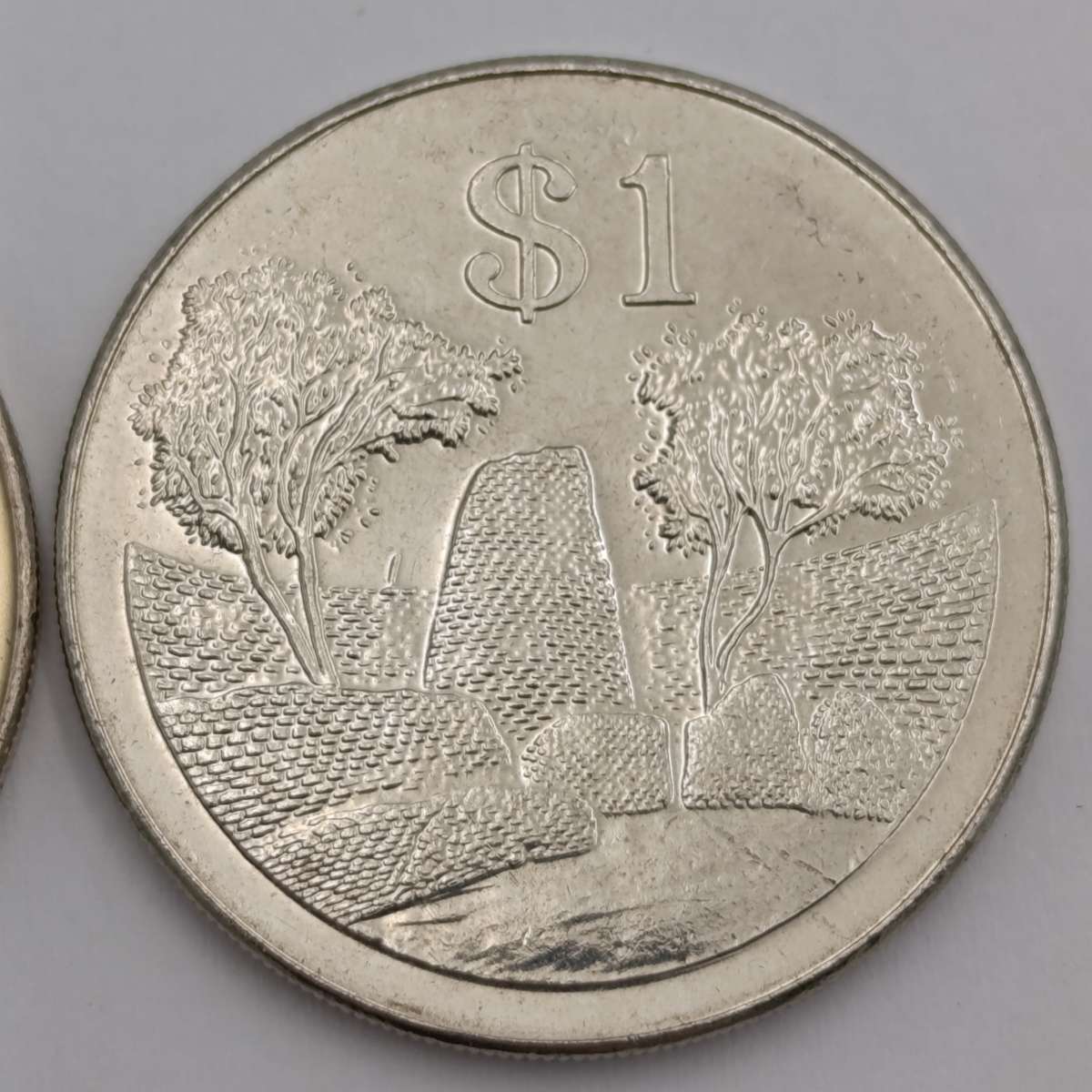 Zimbabwe set of 4 x $ coins 1980, 1993, 1997 & 2001