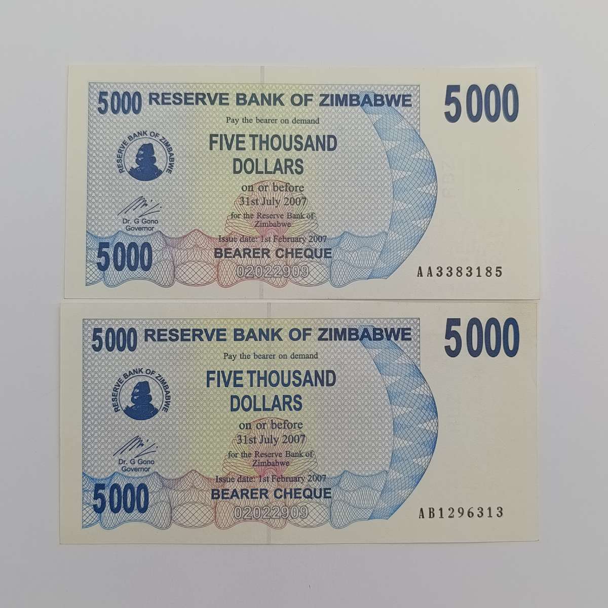 Zimbabwe $5000 Bearer cheques issued 1 Feb 2007 2 uncirculated notes - AA & AB
