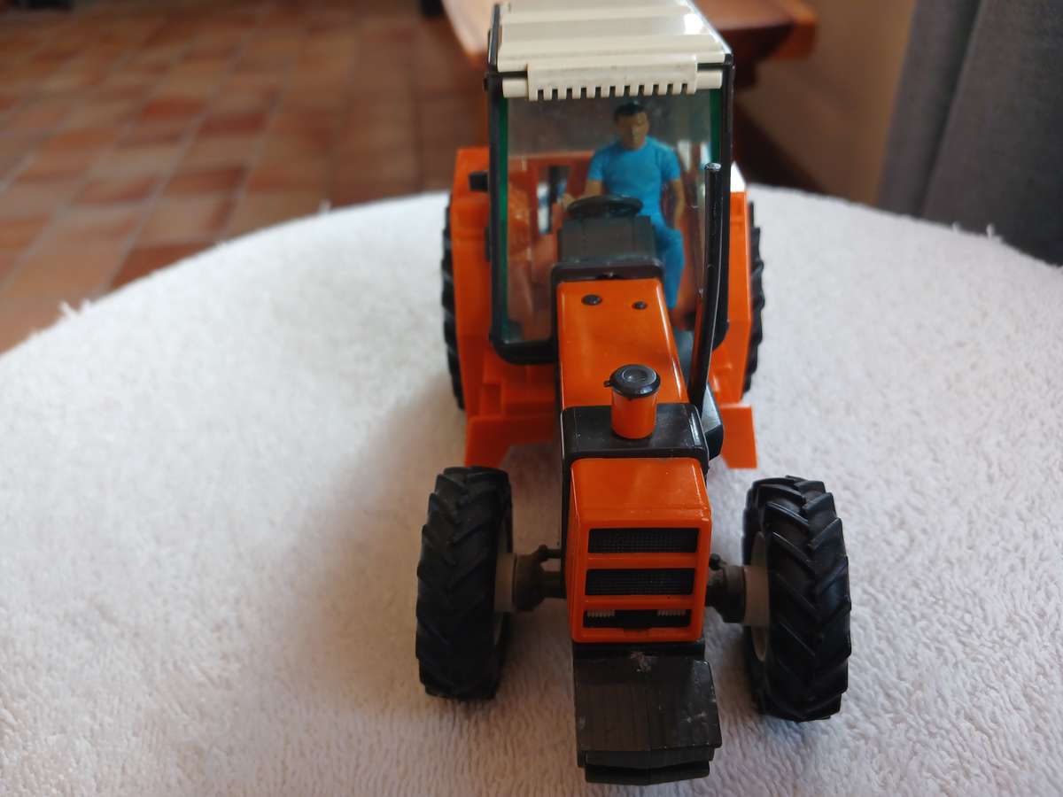 Britains 1985 Renault 145-14 tractor with Britains plough