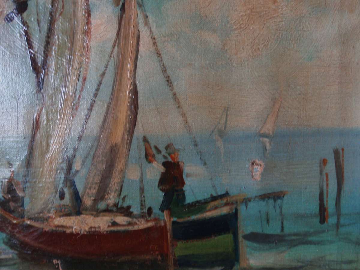 Antique original oil painting on canvas. Fishing boats on beach. In original frame. Charming piece.