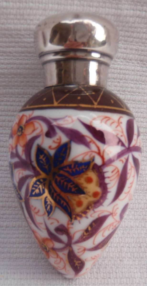 Antique perfume bottle - Charles May  circa 1887. Hand painted porcelain - hall marked silver lid.