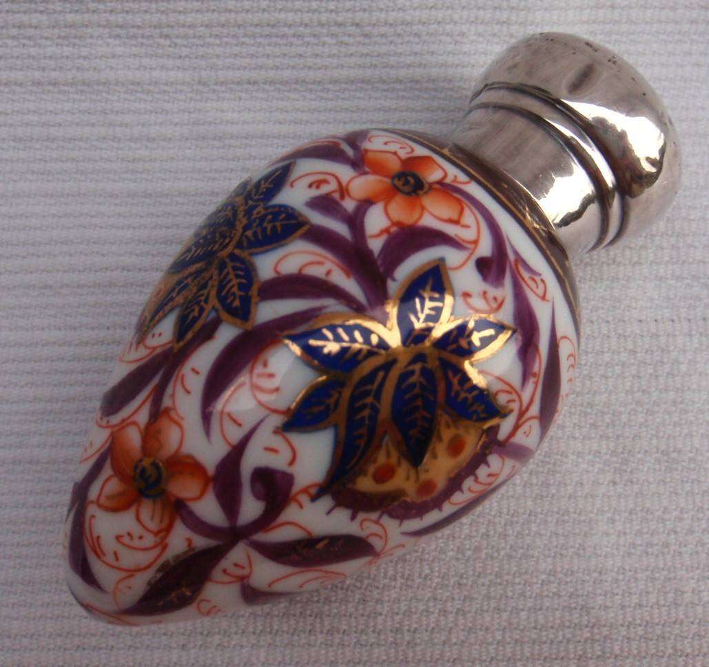 Antique perfume bottle - Charles May  circa 1887. Hand painted porcelain - hall marked silver lid.