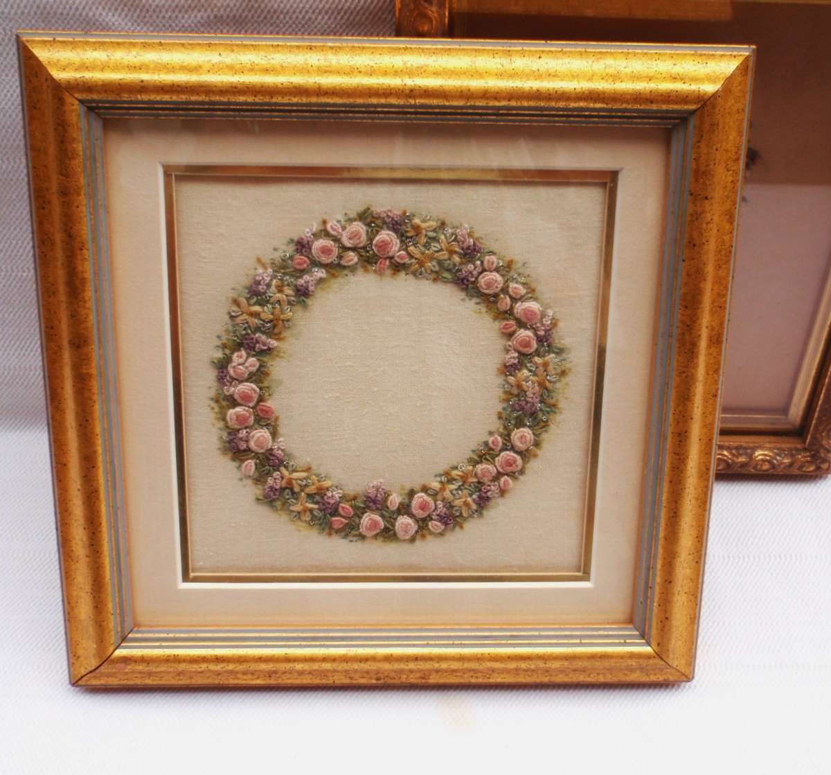 Vintage, a pair of exquisite hand embroidered, miniature rose pictures. Beautifully framed.