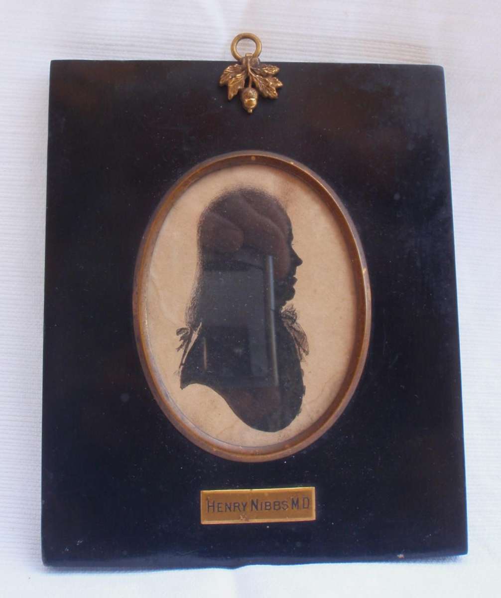 Antique Silhouette art circa 1825. Collectible Georgian art. Henry Nibbs MD Set in brass, name, ring