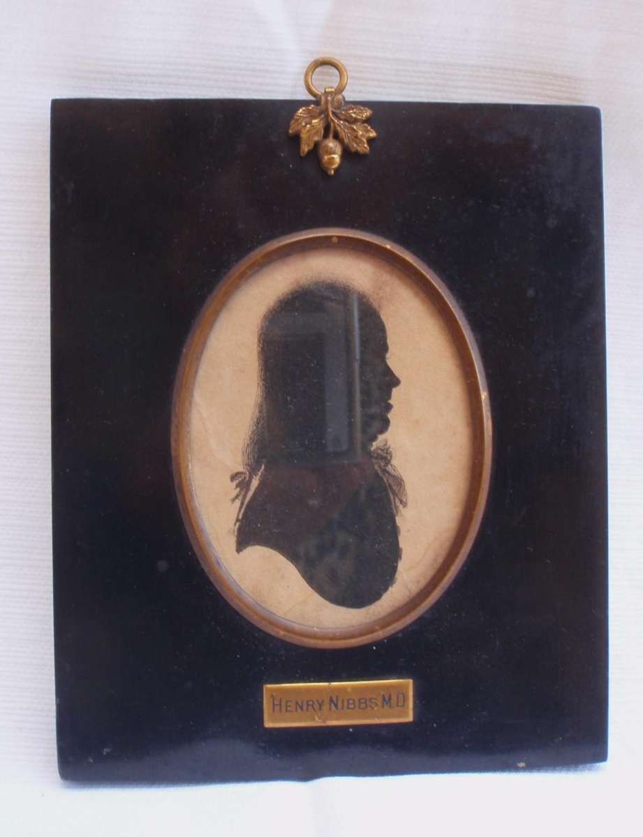 Antique Silhouette art circa 1825. Collectible Georgian art. Henry Nibbs MD Set in brass, name, ring