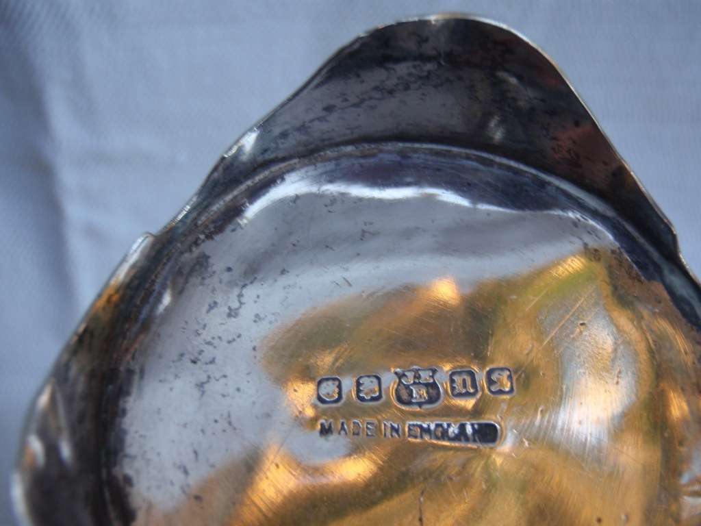 Vintage, a pair of elegant silverplate candle holders - stamped and beautiful to behold.