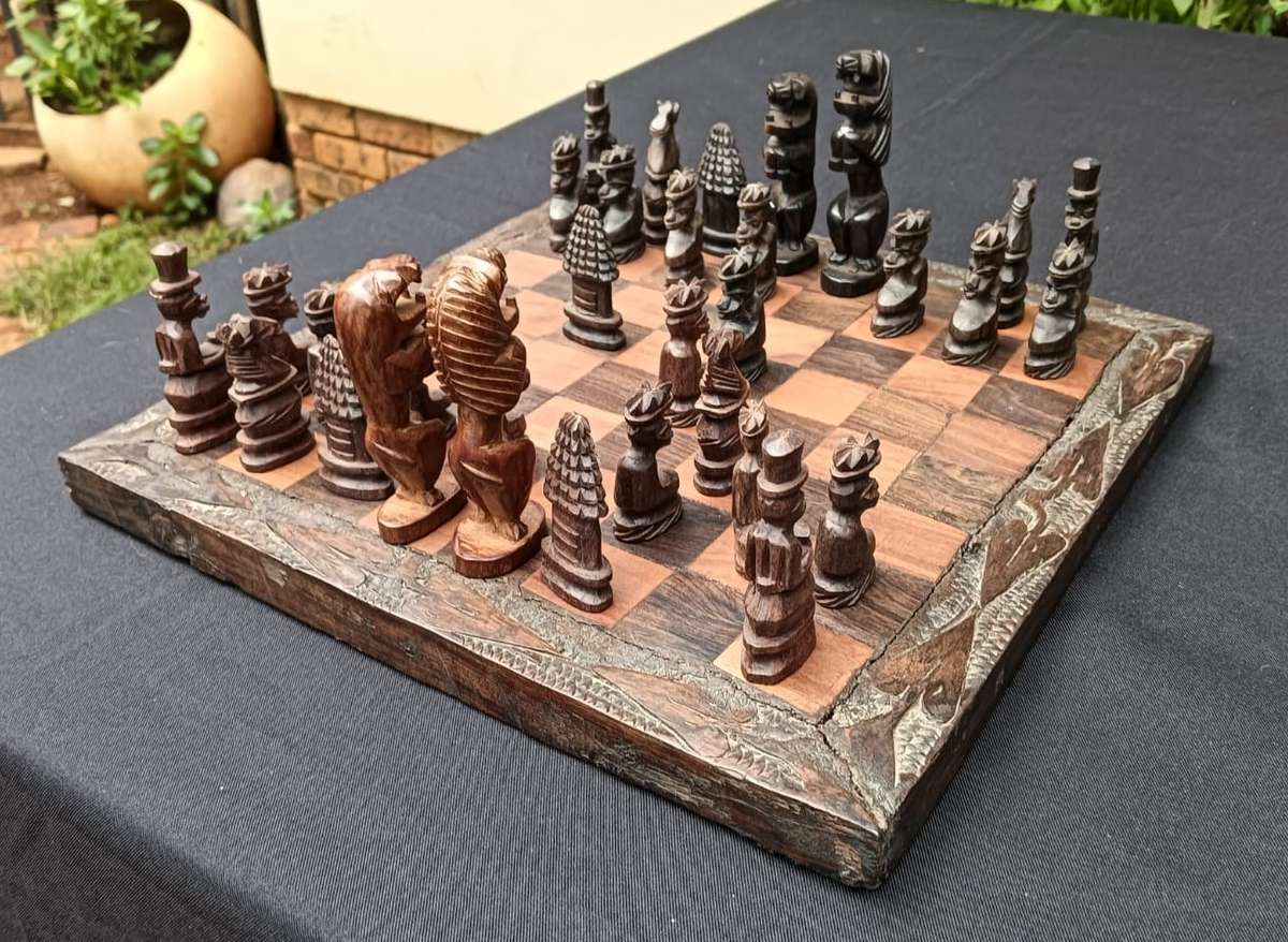 African Hand Carved Wooden Chess Set with Lion King and Queen