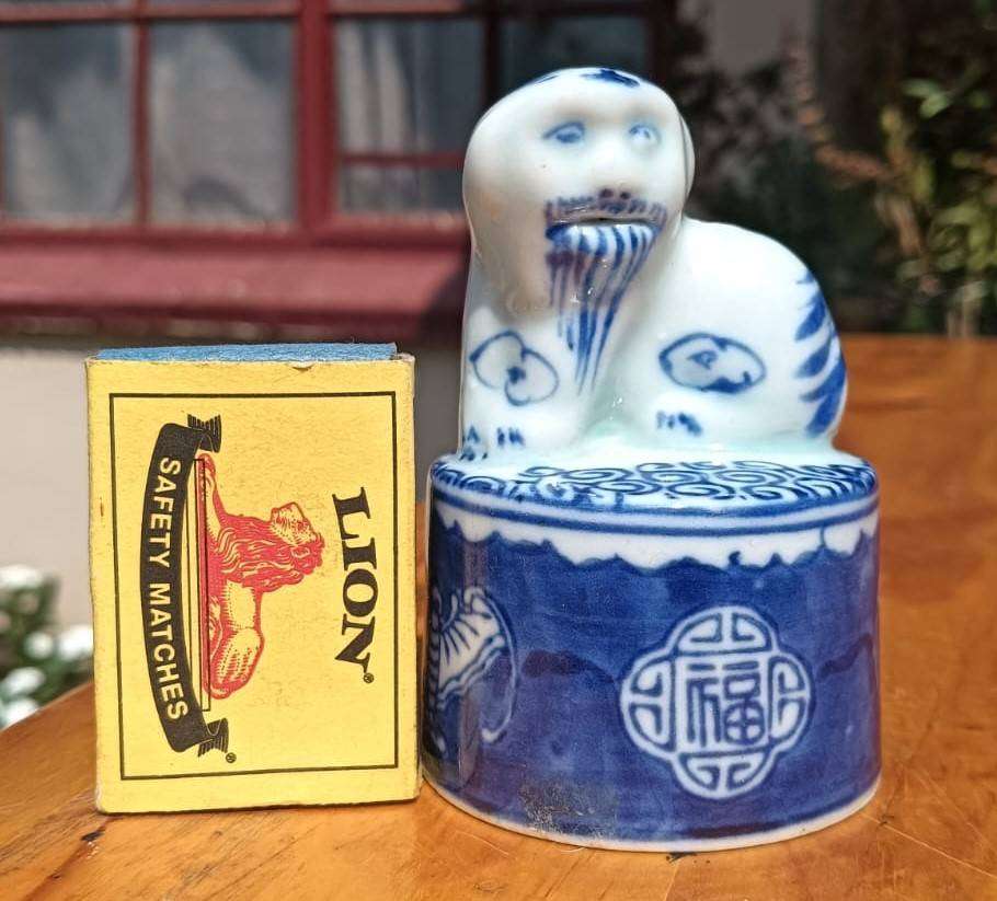 Asian Porcelain Candle Snuffer Fu Dog with Human or Lion Face  Bats and Chinese Longevity Symbols