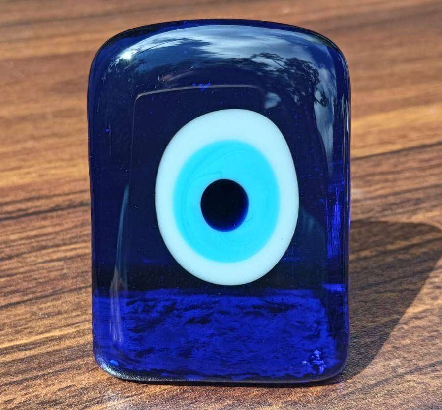 An Evil Eye Glass Paperweight to Protect you from Evil Intentions