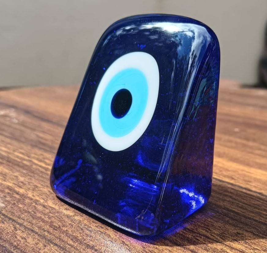 An Evil Eye Glass Paperweight to Protect you from Evil Intentions