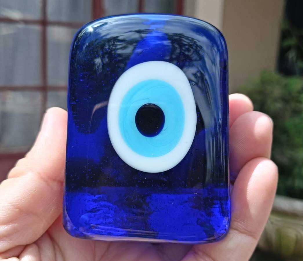 An Evil Eye Glass Paperweight to Protect you from Evil Intentions