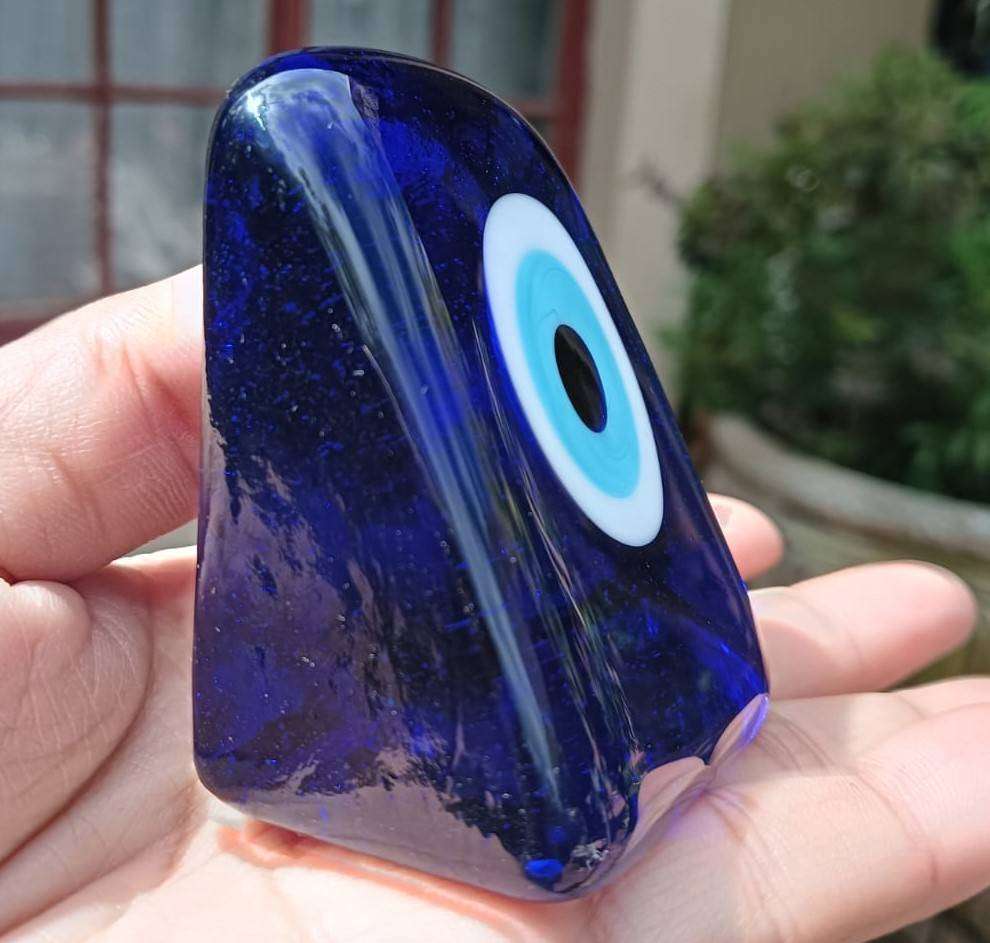 An Evil Eye Glass Paperweight to Protect you from Evil Intentions