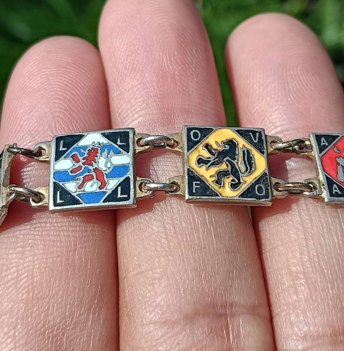 Heraldic Enamelled Coat of Arms Bracelet with Red Black Blue Lion Rampant Panels