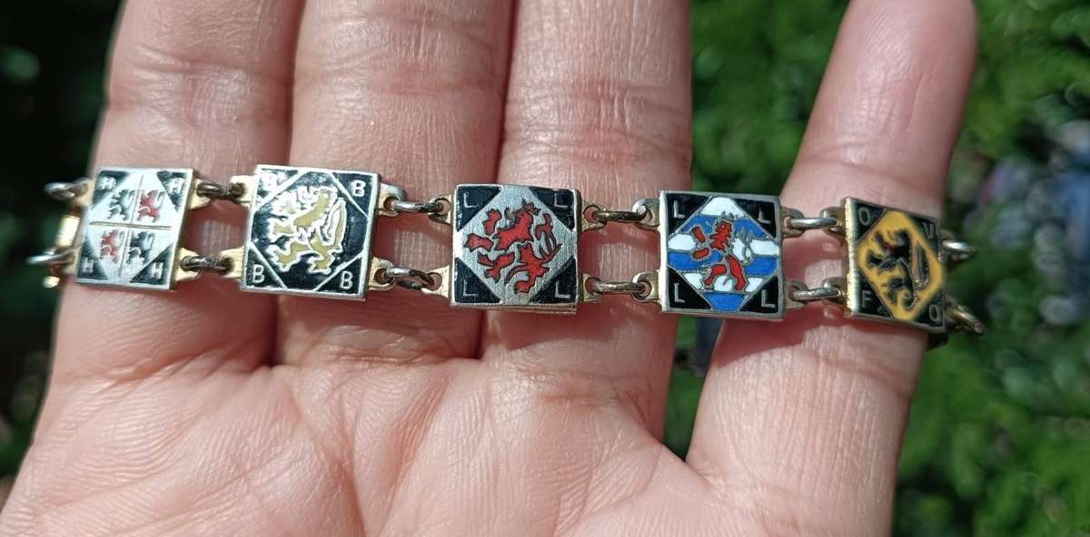 Heraldic Enamelled Coat of Arms Bracelet with Red Black Blue Lion Rampant Panels