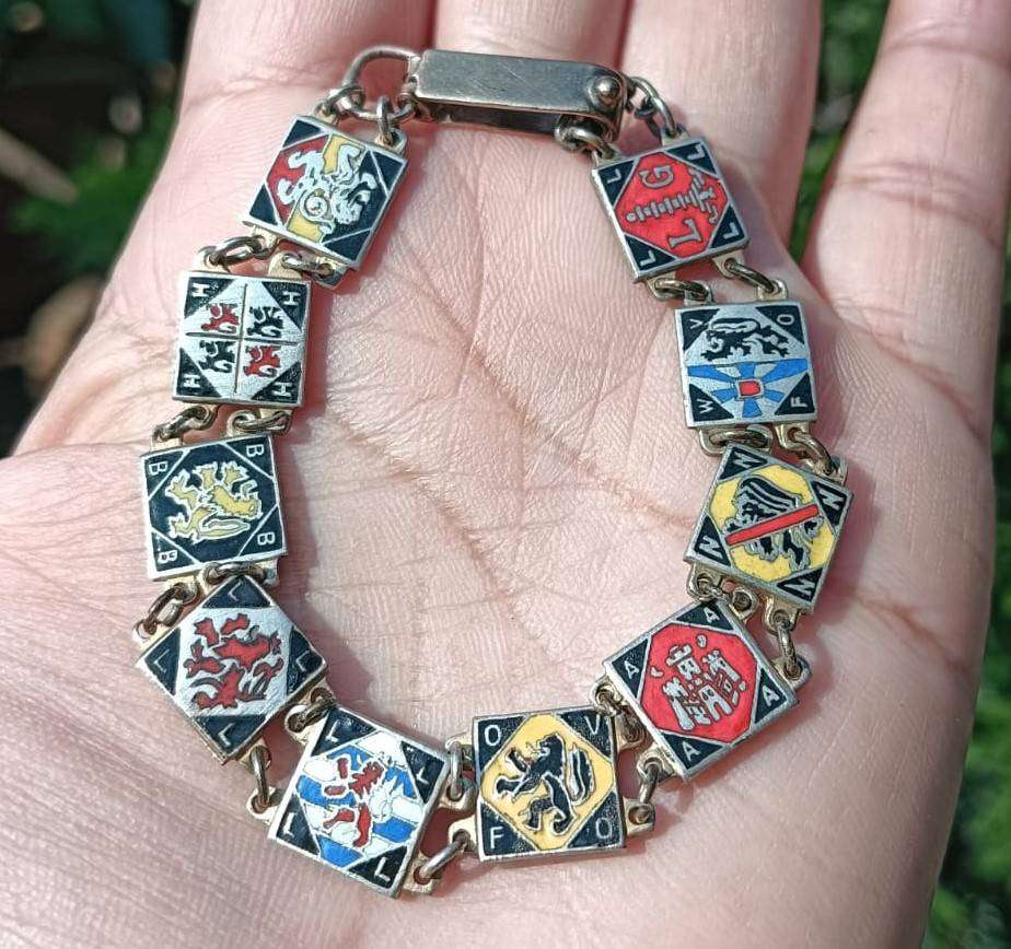 Heraldic Enamelled Coat of Arms Bracelet with Red Black Blue Lion Rampant Panels