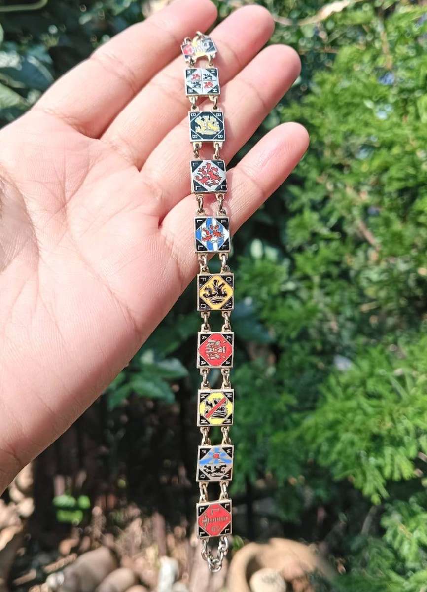 Heraldic Enamelled Coat of Arms Bracelet with Red Black Blue Lion Rampant Panels