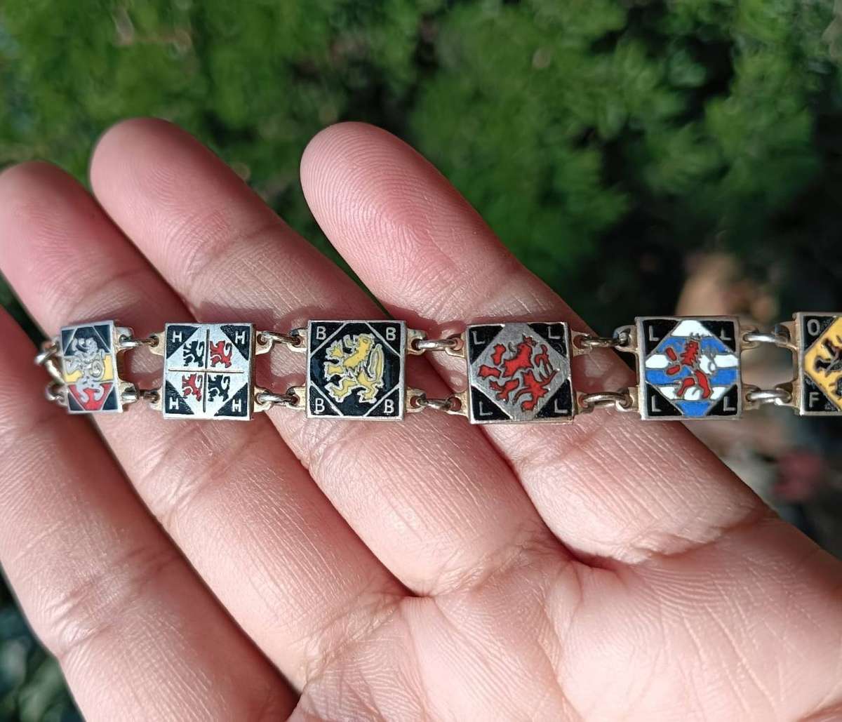 Heraldic Enamelled Coat of Arms Bracelet with Red Black Blue Lion Rampant Panels