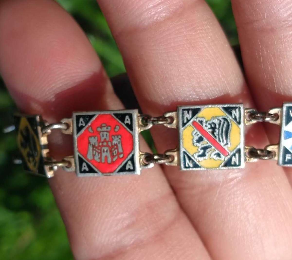 Heraldic Enamelled Coat of Arms Bracelet with Red Black Blue Lion Rampant Panels