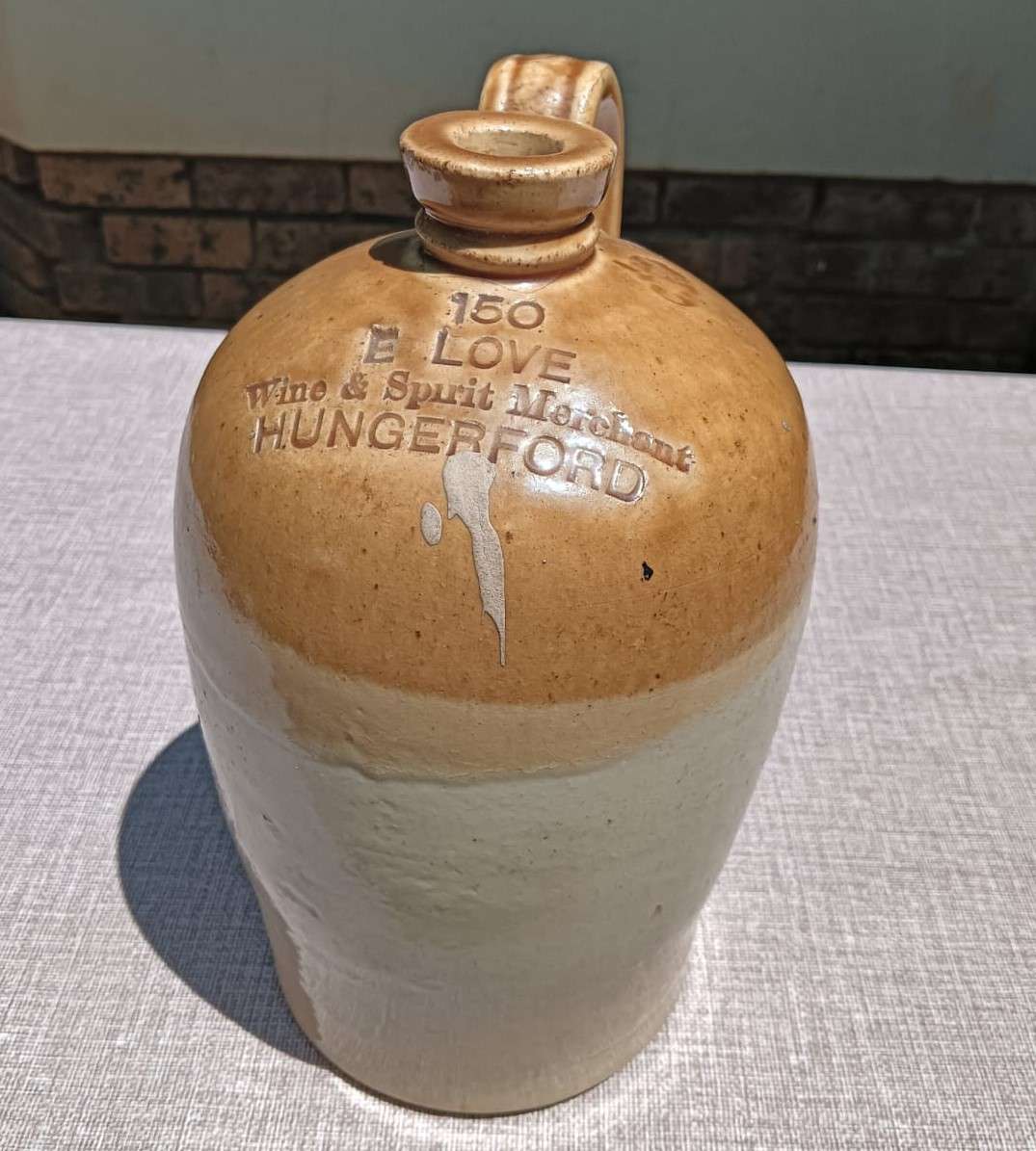 Antique E Love Wine & Spirit Merchant Hungerford England Stoneware Jug with Handle