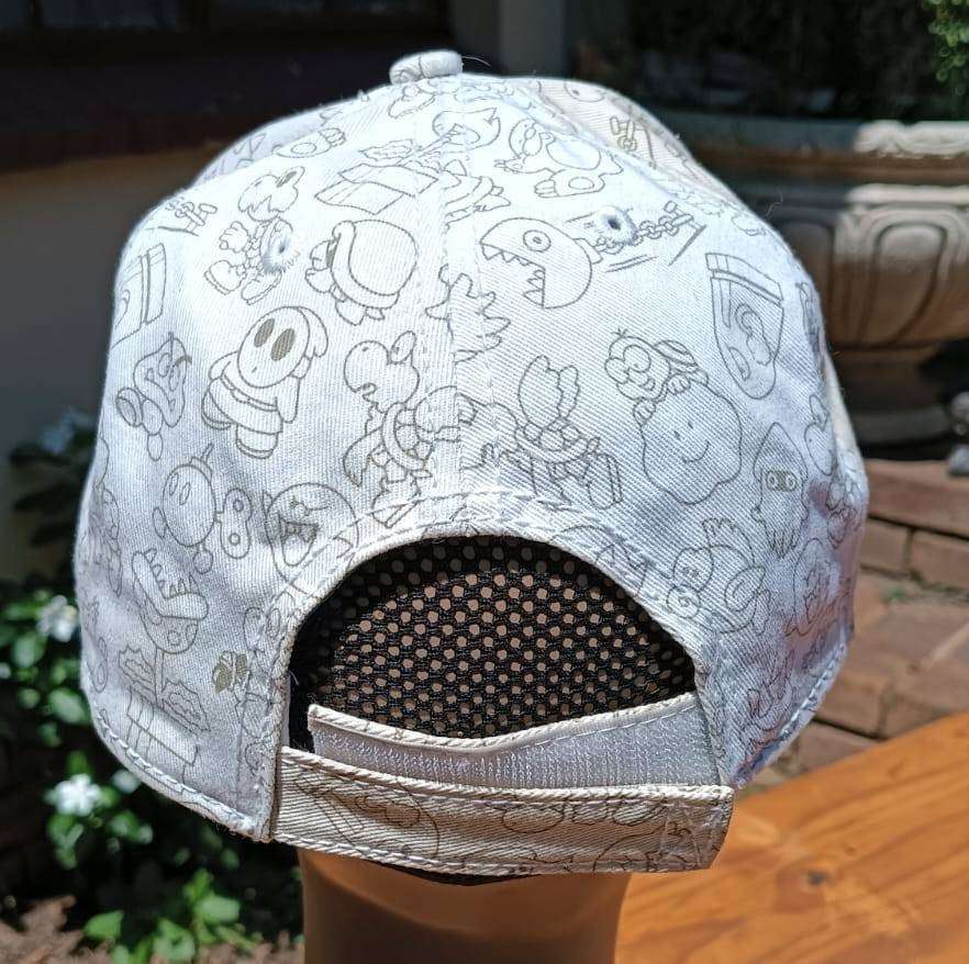 Super Mario Brothers Nintendo 2012 Snapback Cap with 2 pinned Pokemon League Gym Badges