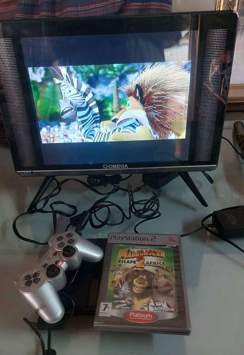 PS 2 Slim SCPH-75004 Console with Dual Shock Controller  Madagascar Game - Tested and Working Well!