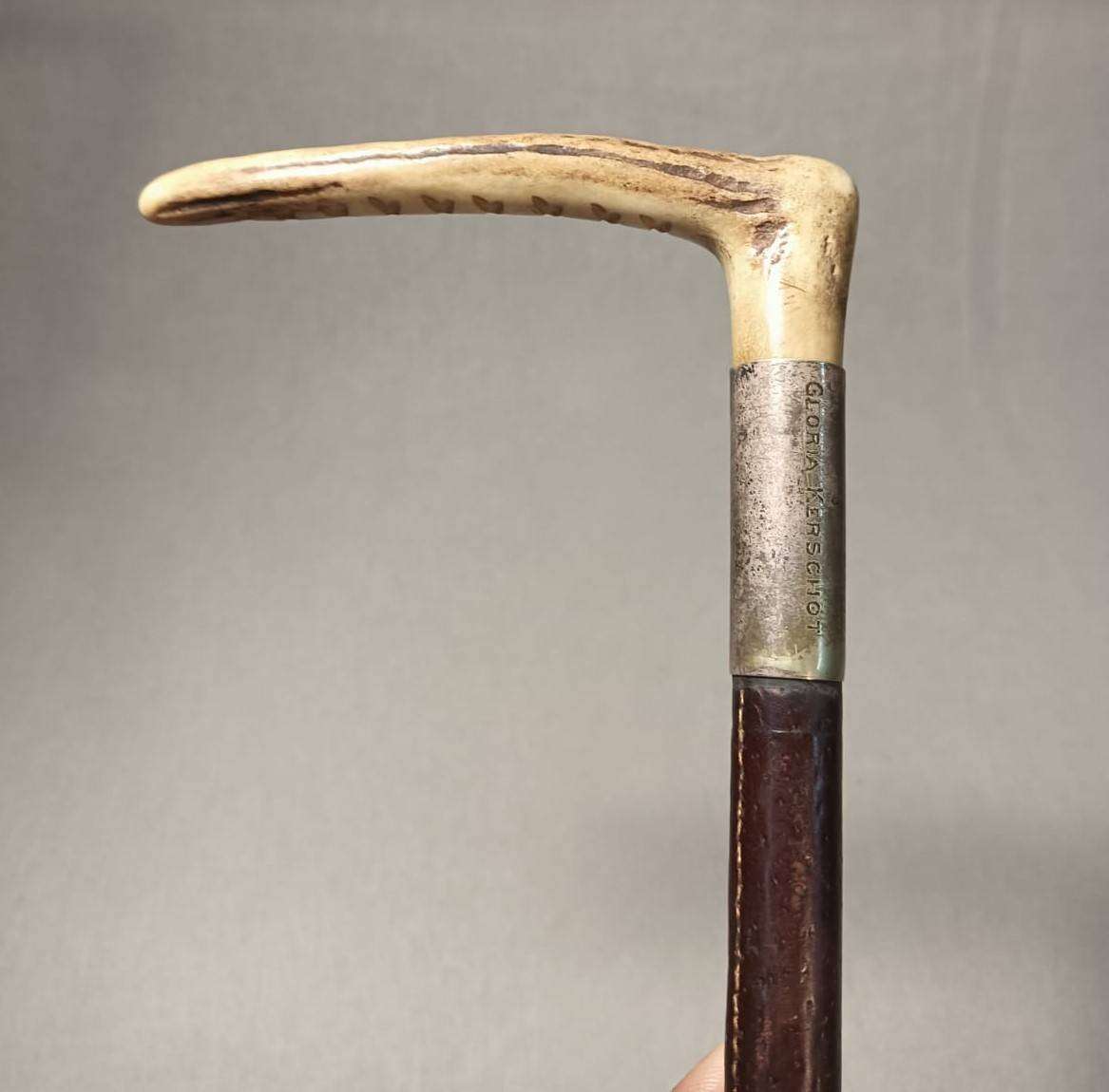 Two Antique Leather and Bone Handle Hunting Crops one with a Gloria Kerschot Silver Metal Collar