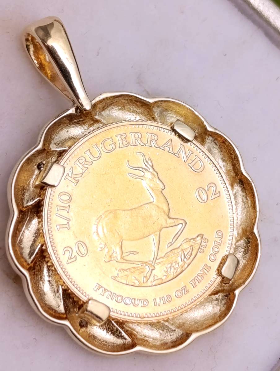 1/10th Kruger on 9ct Diamond Studded Pendant