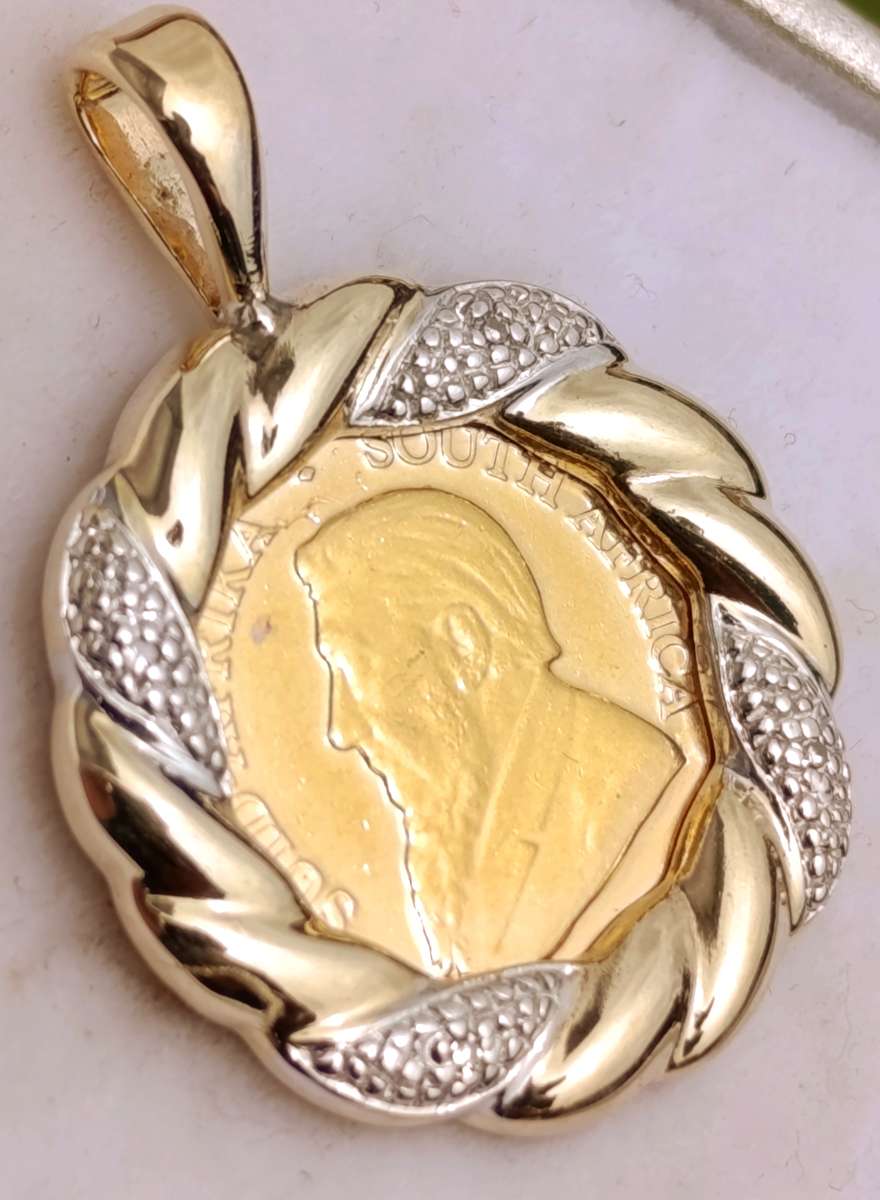 1/10th Kruger on 9ct Diamond Studded Pendant