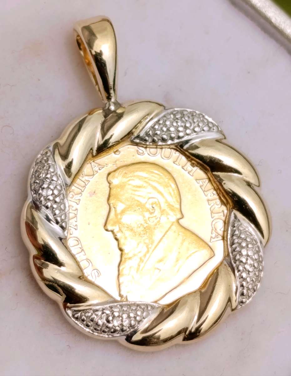 1/10th Kruger on 9ct Diamond Studded Pendant