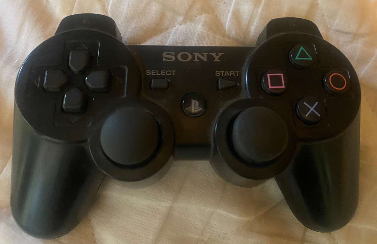 Original Sony Black Ps3 controller .