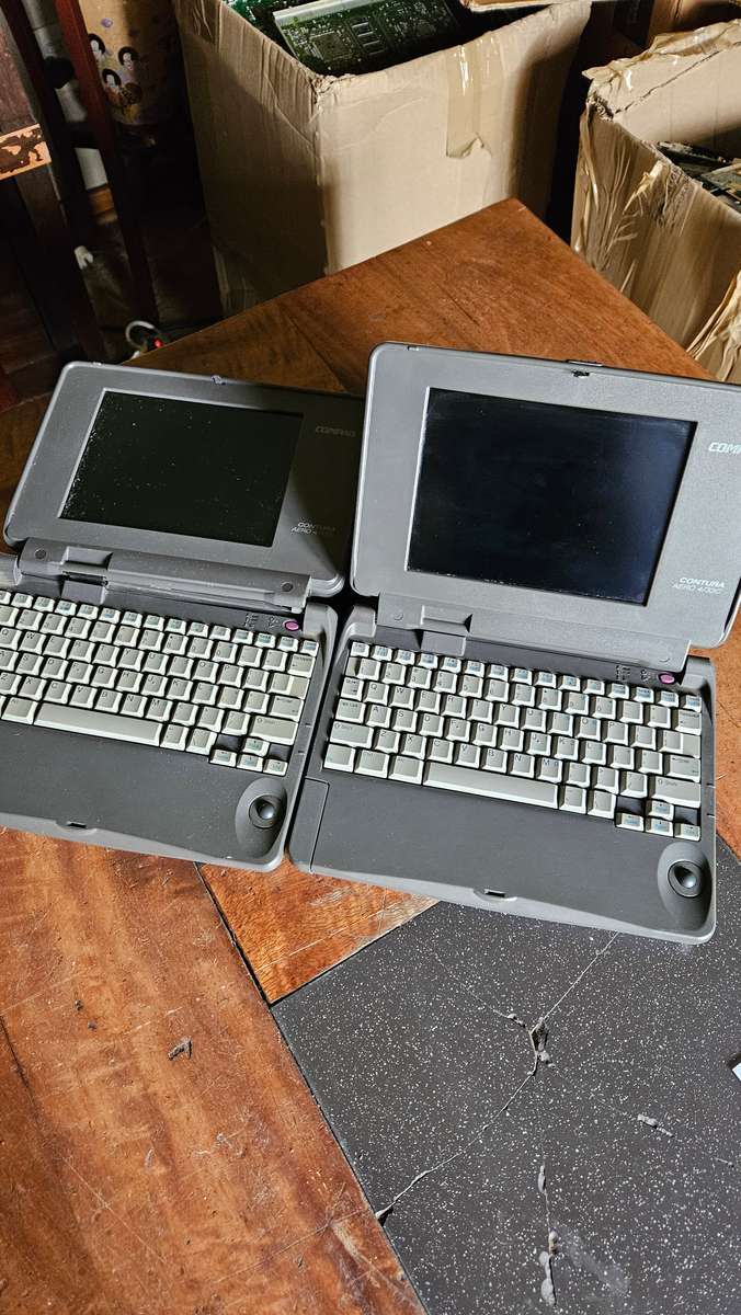 Two Compaq Contura Arero 4/33 C Laptops
