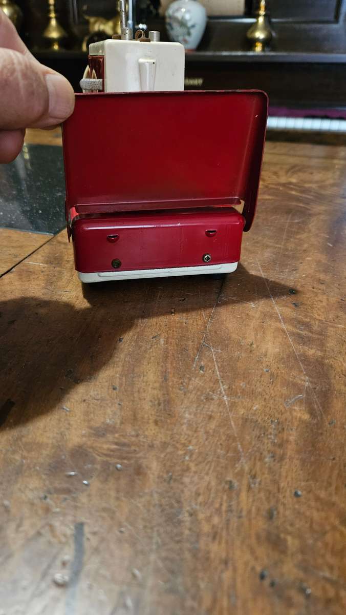 Two Vintage Sewmate Toy Sewing Machines