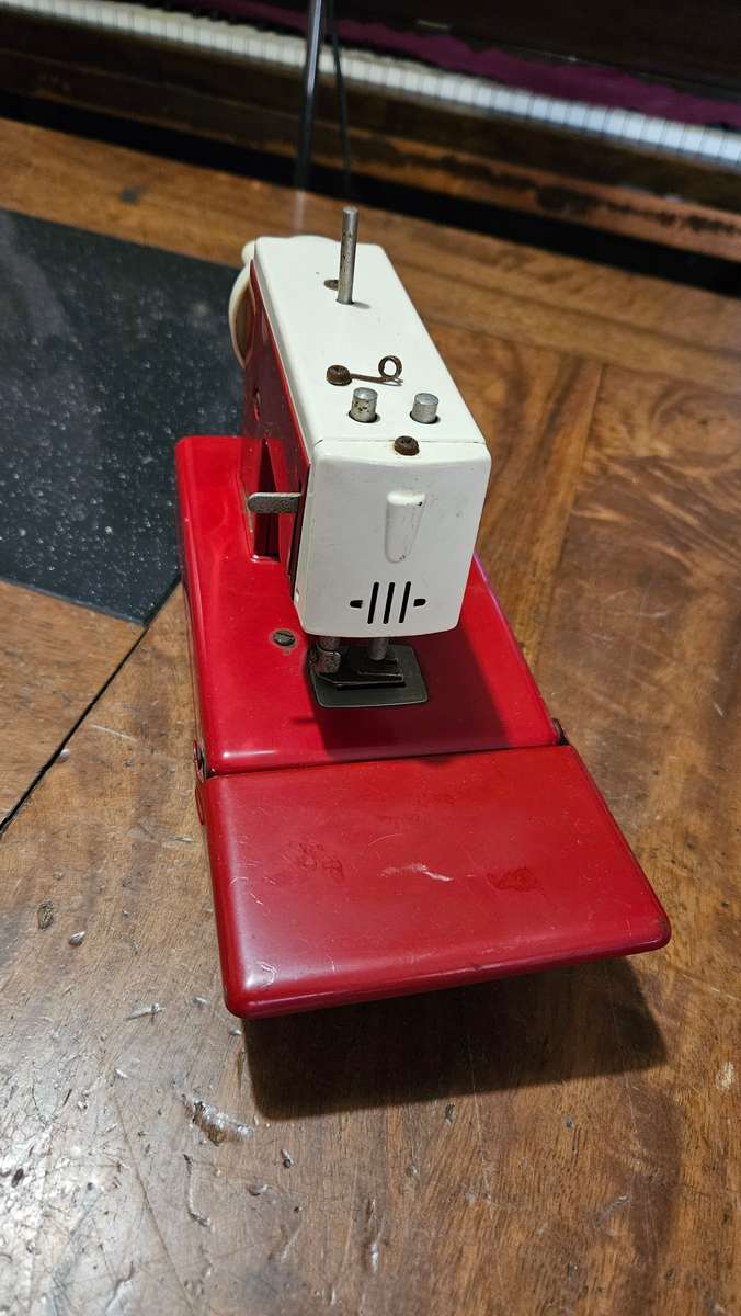 Two Vintage Sewmate Toy Sewing Machines