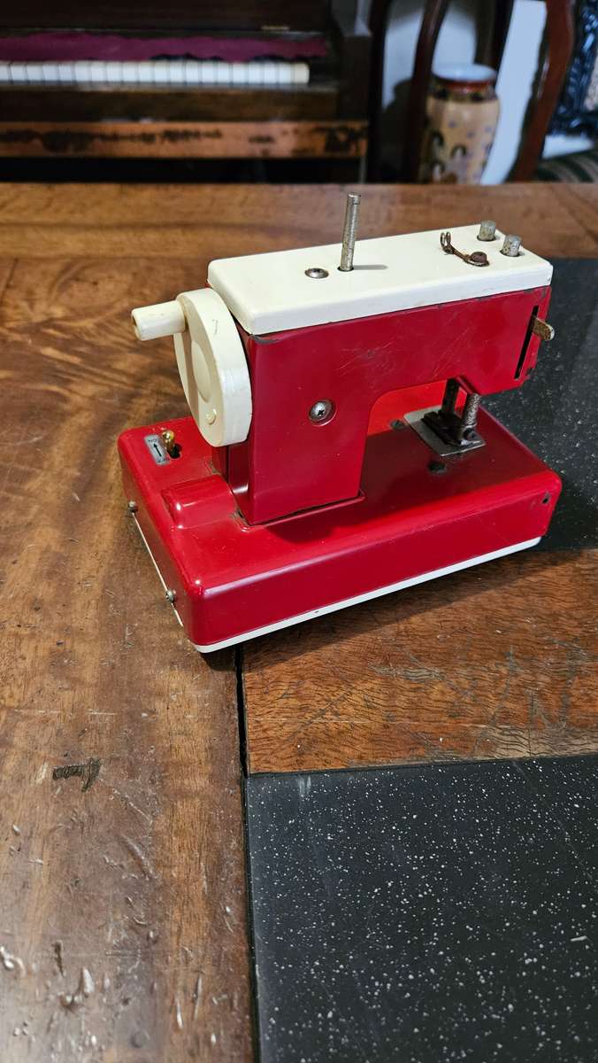 Two Vintage Sewmate Toy Sewing Machines