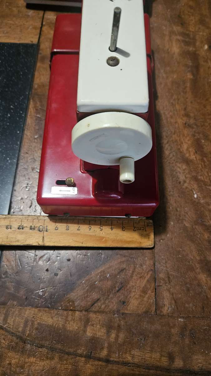 Two Vintage Sewmate Toy Sewing Machines