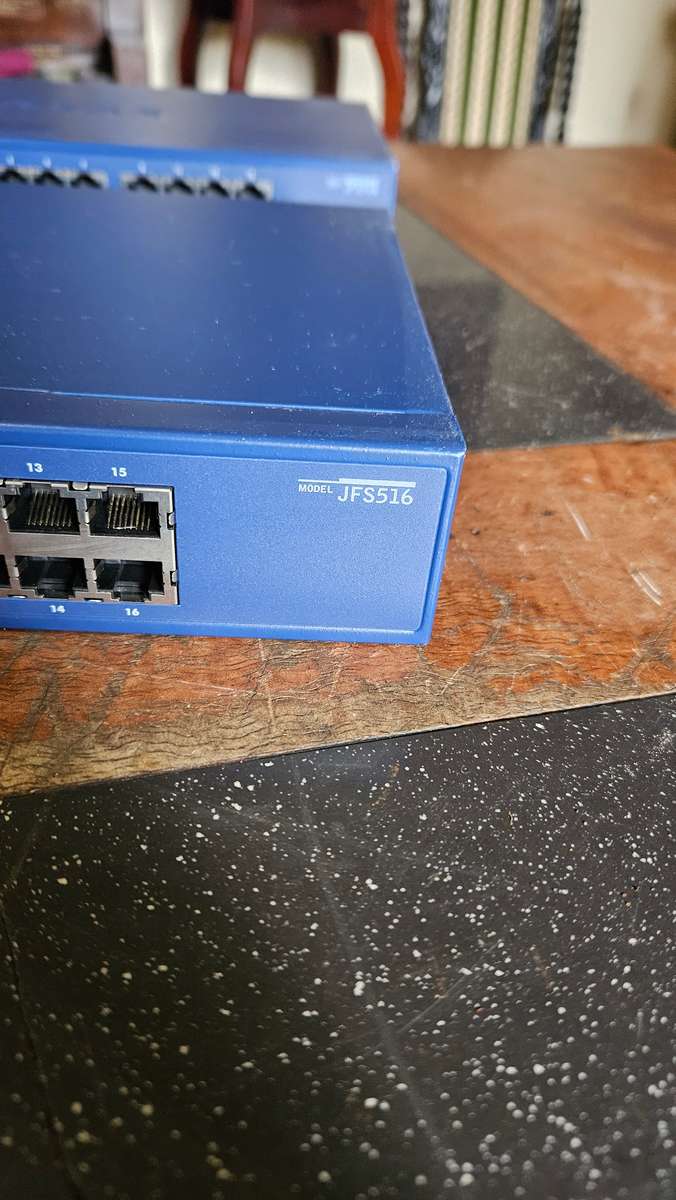 2 X NETGEAR Prosafe 16 Port 10/100 Switch. "Unused"