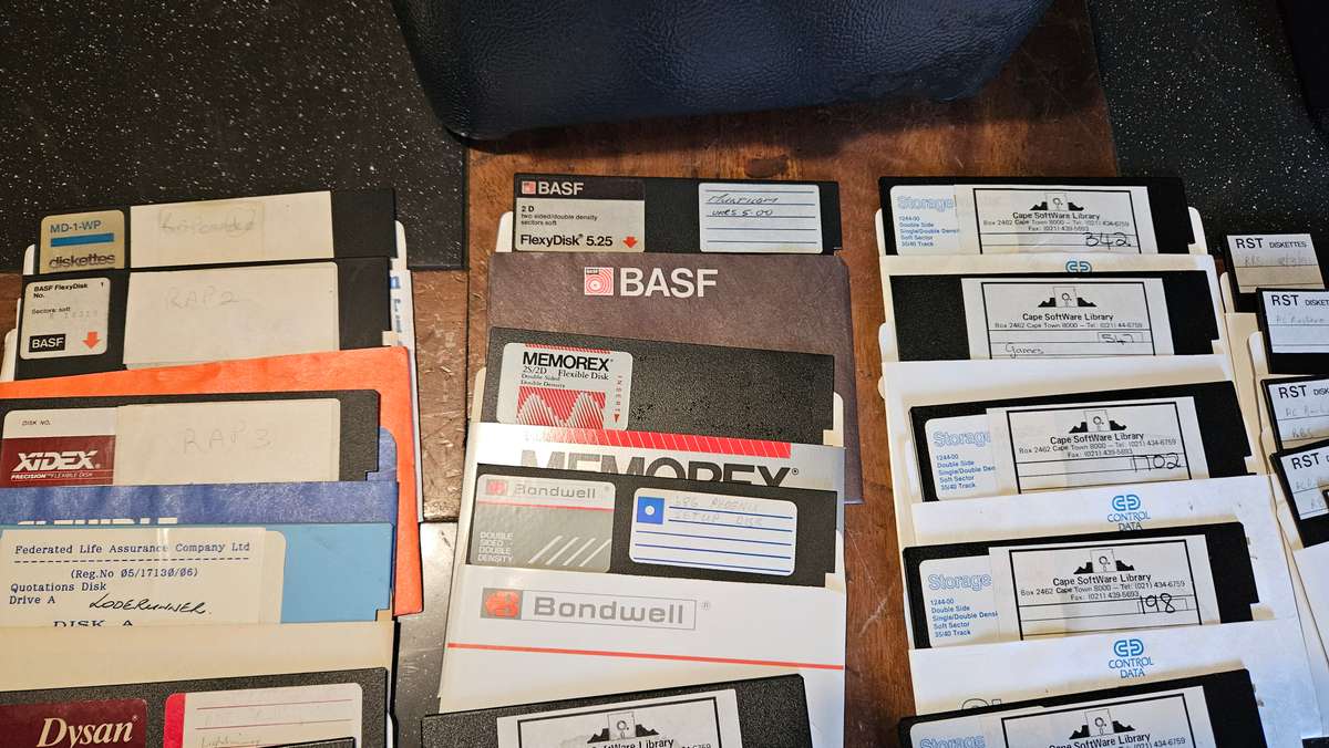 Vintage Floppy Disks Plus Containers